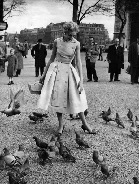 A Givenchy design in blue pique, modelled in Paris, which is successfully copied by Polly Peck, dress makers from Commercial Road in East London, for a fraction of the price of the couture original. Original Publication: Picture Post - 7683 - How Paris Fashions Reach You - pub 1955 (Photo by Jacques Rouchon/Getty Images)