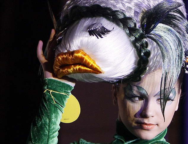 A model presents a hairstyle during the 7th international festival of hairdressing art, fashion and design called "Crystal Angel" in Kiev, April 18, 2013. REUTERS/Gleb Garanich (UKRAINE - Tags: SOCIETY TPX IMAGES OF THE DAY ENTERTAINMENT)